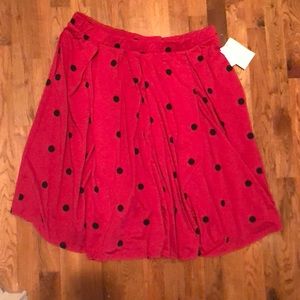 Minnie Mouse like 😀 Dark pink with black dots.